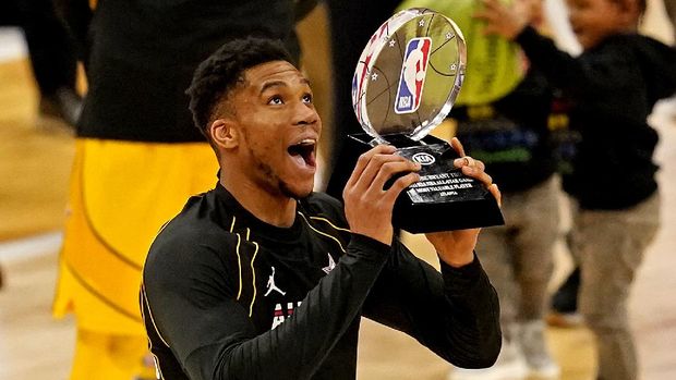 Mar 7, 2021; Atlanta, Georgia, USA;  Team LeBron forward Giannis Antetokounmpo of the Milwaukee Bucks (34)  reacts to being named the MVP of the 2021 NBA All-Star Game at State Farm Arena. Mandatory Credit: Dale Zanine-USA TODAY Sports