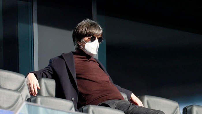FRANKFURT AM MAIN, GERMANY - FEBRUARY 20: Joachim Loew, Head Coach of Germany looks on from the stands prior to the Bundesliga match between Eintracht Frankfurt and FC Bayern Muenchen at Deutsche Bank Park on February 20, 2021 in Frankfurt am Main, Germany. Sporting stadiums around Germany remain under strict restrictions due to the Coronavirus Pandemic as Government social distancing laws prohibit fans inside venues resulting in games being played behind closed doors. (Photo by Ronald Wittek - Pool/Getty Images)