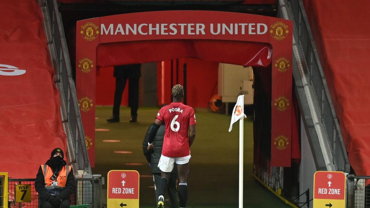 Paul Pogba bisa survive di Man United karena Timnas Prancis (Getty Images/Michael Regan)