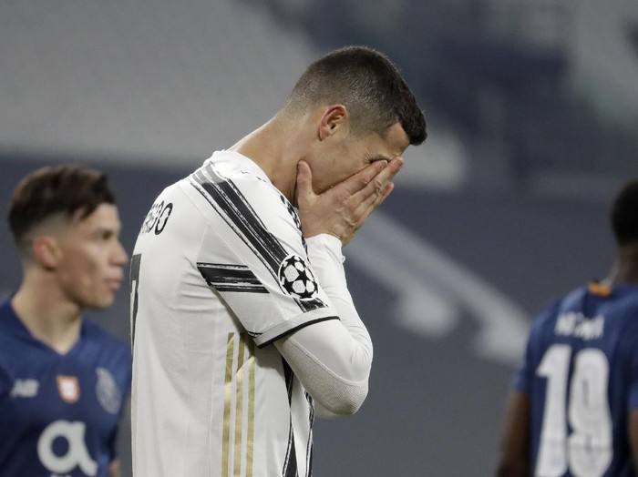 Juventus' Cristiano Ronaldo reacts during the Champions League, round of 16, second leg, soccer match between Juventus and Porto in Turin, Italy, Tuesday, March 9, 2021. (AP Photo/Luca Bruno)