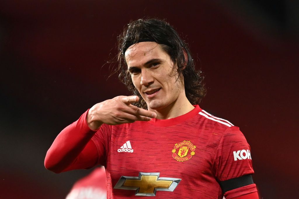 MANCHESTER, ENGLAND - FEBRUARY 06:  Edinson Cavani of Manchester United celebrates after scoring their team's first goal during the Premier League match between Manchester United and Everton at Old Trafford on February 06, 2021 in Manchester, England. Sporting stadiums around the UK remain under strict restrictions due to the Coronavirus Pandemic as Government social distancing laws prohibit fans inside venues resulting in games being played behind closed doors. (Photo by Michael Regan/Getty Images)