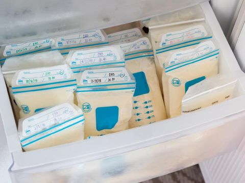 breast milk in plastic bags on refrigerator shelf, frozen mother milk  for infant, breastfeeding