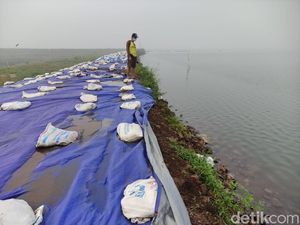 Cerita Warga di Bawah Tanggul Lumpur Sidoarjo yang Dihantui Kecemasan Cerita Warga di Bawah Tanggul Lumpur Sidoarjo yang Dihantui Kecemasan