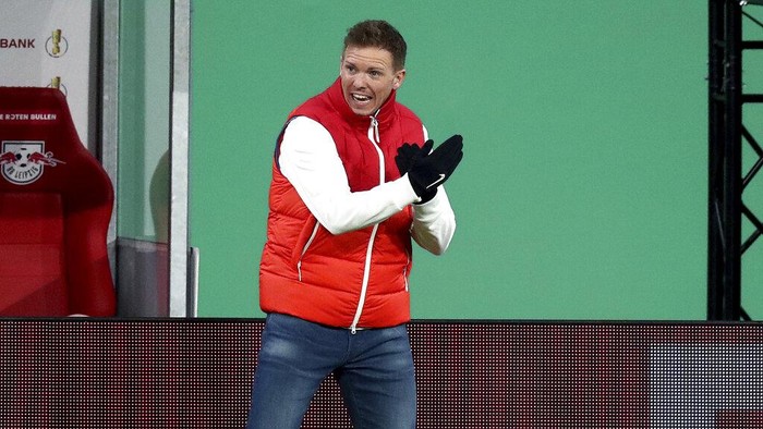 Leipzigs head coach Julian Nagelsmann gestures during the German soccer cup, DFB Pokal, quarter final match between RB Leipzig and VfL Wolfsburg in Leipzig, Germany, Wednesday, March 3, 2021. (AP Photo/Michael Sohn)