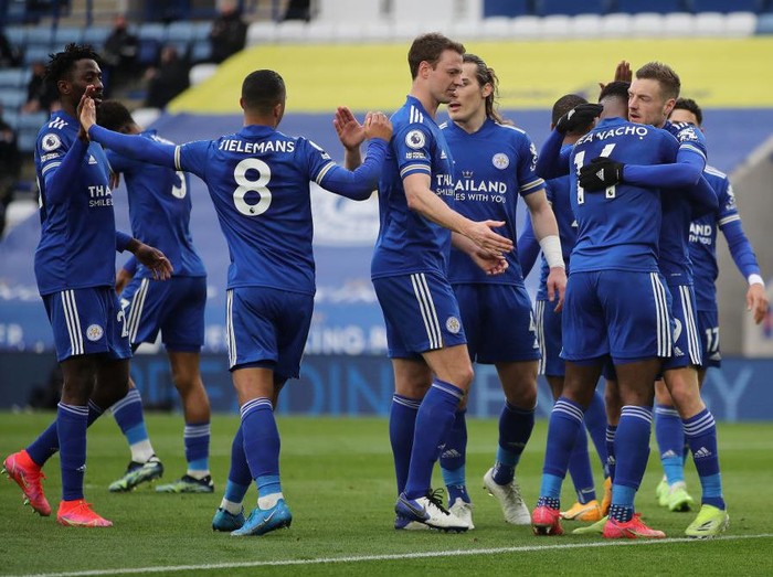 LEICESTER, ENGLAND - MARCH 14: Kelechi Iheanacho of Leicester City celebrates with Jamie Vardy after scoring their sides first goal during the Premier League match between Leicester City and Sheffield United at The King Power Stadium on March 14, 2021 in Leicester, England. Sporting stadiums around the UK remain under strict restrictions due to the Coronavirus Pandemic as Government social distancing laws prohibit fans inside venues resulting in games being played behind closed doors. (Photo by Molly Darlington - Pool/Getty Images)