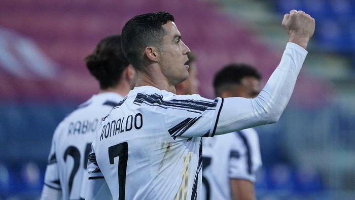 Juventus Cristiano Ronaldo celebrates after scoring his sides second goal during the Italian Serie A soccer match between Cagliari and Juventus, at the Sardegna Arena stadium in Cagliari, Italy, Sunday, March 14, 2021. (Alessandro Tocco/LaPresse via AP)