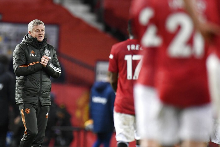 Manchester Uniteds manager Ole Gunnar Solskjaer reacts following the English Premier League soccer match between Manchester United and West Ham United at Old Trafford, Manchester, England, Sunday, March. 14, 2021. (AP Photo/Peter Powell,Pool)