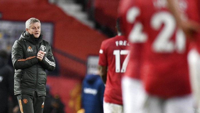 Manchester Uniteds manager Ole Gunnar Solskjaer reacts following the English Premier League soccer match between Manchester United and West Ham United at Old Trafford, Manchester, England, Sunday, March. 14, 2021. (AP Photo/Peter Powell,Pool)