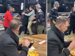 Santuy! Orang-orang Ini Tetap Makan di Tengah Kebakaran dan Keributan