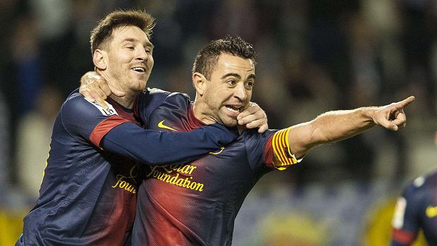 VALLADOLID, SPAIN - DECEMBER 22:  Xavi Hernandez of FC Barcelona celebrates with his teammate Lionel Messi after scoring against Real Valladolid during the La Liga game between Real Valladolid and FC Barcelona at Jose Zorrilla on December 22, 2012 in Valladolid, Spain.  (Photo by Victor Fraile/Getty Images)