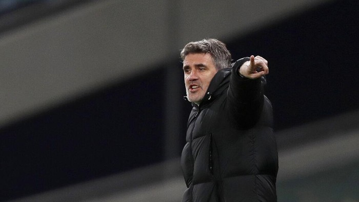 FILE -  In this Thursday, March 11, 2021 file photo Dinamo Zagrebs manager Zoran Mamic gestures during the Europa League round of 16, first leg, soccer match between Tottenham Hotspur and Dinamo Zagreb at the Tottenham Hotspur Stadium in London, England.  According to a statement late Monday March 15, 2021, Mamic has resigned after the Croatian supreme court confirmed his nearly five-year prison sentence for tax evasion and fraud, just days before a Europa League match against Tottenham.(AP photo/Alastair Grant, Pool, File)