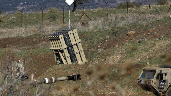 A battery of Israels Iron Dome, designed to intercept and destroy incoming short-range rockets and artillery shells, is pictured in the Israeli-annexed Golan Heights near the border with Syria, on November 18, 2020. - Israeli warplanes struck Syria Wednesday, hitting Iranian targets and killing 10 Syrian and foreign fighters in what the Israeli army called a retaliatory attack after explosive devices were found near one of its bases on the occupied Golan Heights. (Photo by JALAA MAREY / AFP)