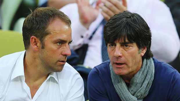 GDANSK, POLAND - JUNE 18:  Joachim Loew (R), head coach of Germany and assistant coach Hansi Flick look on during the UEFA EURO 2012 group C match between Croatia and Spain at The Municipal Stadium on June 18, 2012 in Gdansk, Poland.  (Photo by Alex Grimm/Getty Images)