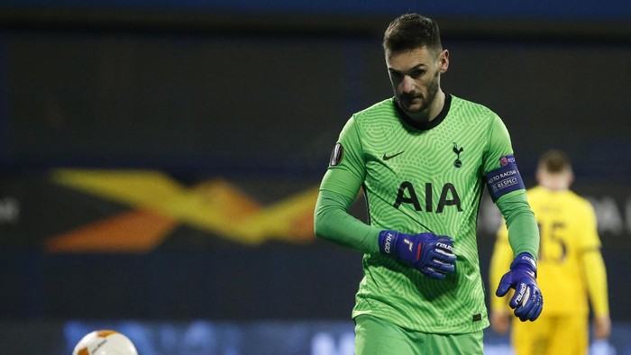 Tottenhams goalkeeper Hugo Lloris gestures after Dinamo Zagrebs Mislav Orsic scores his sides opening goal during the Europa League round of 16 second leg soccer match between Dinamo Zagreb and Tottenham Hotspur at the Maksimir stadium in Zagreb, Croatia, March 18, 2021. (AP Photo/Darko Bandic)