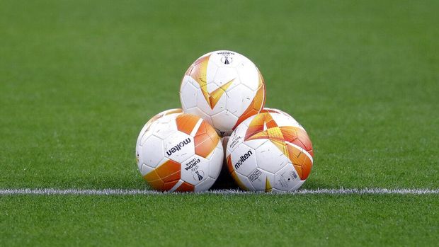 Balls are placed on the pitch ahead of the Europa League, round of 16, second leg soccer match, between Granada and Molde FK at the Puskas Arena stadium in Budapest, Hungary, Thursday, March 18, 2021. (AP Photo/Laszlo Balogh)