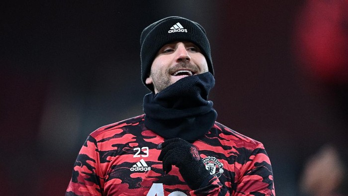 MANCHESTER, ENGLAND - FEBRUARY 25: Luke Shaw of Manchester United reacts during the warm up prior to the UEFA Europa League Round of 32 match between Manchester United and Real Sociedad at Old Trafford on February 25, 2021 in Manchester, England. Sporting stadiums around the UK remain under strict restrictions due to the Coronavirus Pandemic as Government social distancing laws prohibit fans inside venues resulting in games being played behind closed doors. (Photo by Laurence Griffiths/Getty Images)