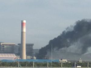 Asap Membubung Hitam Berasal dari Kebakaran di PLTU Jawa 7