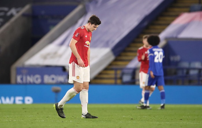 LEICESTER, ENGLAND - MARCH 21: Harry Maguire of Manchester United looks dejected after the Emirates FA Cup Quarter Final  match between Leicester City and Manchester United at The King Power Stadium on March 21, 2021 in Leicester, England. Sporting stadiums around the UK remain under strict restrictions due to the Coronavirus Pandemic as Government social distancing laws prohibit fans inside venues resulting in games being played behind closed doors.  (Photo by Alex Pantling/Getty Images)