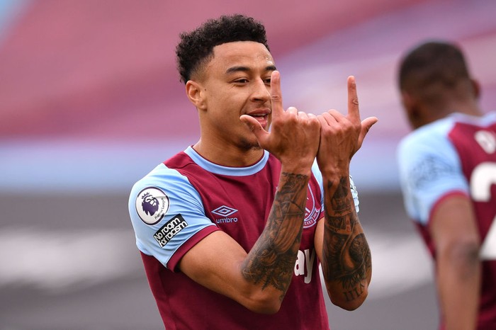LONDON, ENGLAND - MARCH 21: Jesse Lingard of West Ham United celebrates after scoring their sides first goal during the Premier League match between West Ham United and Arsenal at London Stadium on March 21, 2021 in London, England. Sporting stadiums around the UK remain under strict restrictions due to the Coronavirus Pandemic as Government social distancing laws prohibit fans inside venues resulting in games being played behind closed doors.  (Photo by Justin Tallis - Pool/Getty Images)