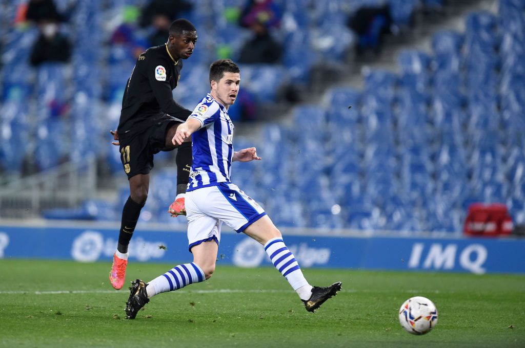 BARCELONA, SPAIN - MARCH 15: Ousmane Dembele of FC Barcelona runs with the ball during the La Liga Santander match between FC Barcelona and SD Huesca at Camp Nou on March 15, 2021 in Barcelona, Spain. Sporting stadiums around Spain remain under strict restrictions due to the Coronavirus Pandemic as Government social distancing laws prohibit fans inside venues resulting in games being played behind closed doors. (Photo by David Ramos/Getty Images)
