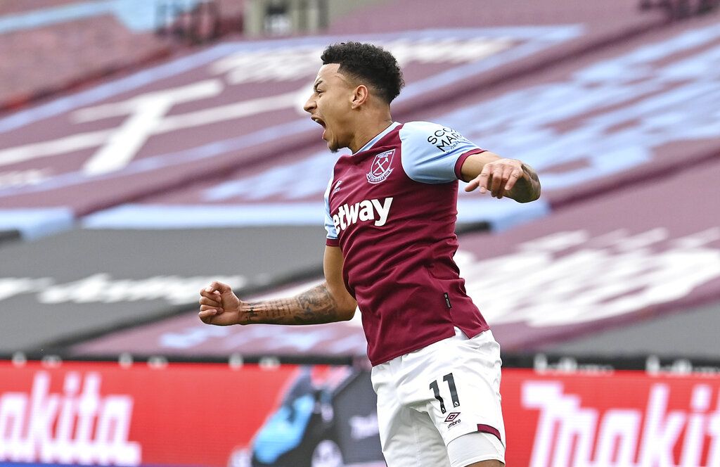West Ham's Jesse Lingard celebrates after scoring his side's opening goal during the English Premier League soccer match between West Ham United and Arsenal at the London Stadium in London, England, Sunday, March 21, 2021. (Justin Tallis, Pool via AP)