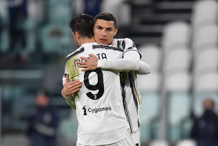 TURIN, ITALY - MARCH 02: Cristiano Ronaldo of Juventus celebrates with team mate Alvaro Morata after scoring their sides third goal during the Serie A match between Juventus and Spezia Calcio at Allianz Stadium on March 02, 2021 in Turin, Italy. Sporting stadiums around the Italy remain under strict restrictions due to the Coronavirus Pandemic as Government social distancing laws prohibit fans inside venues resulting in games being played behind closed doors. (Photo by Valerio Pennicino/Getty Images)