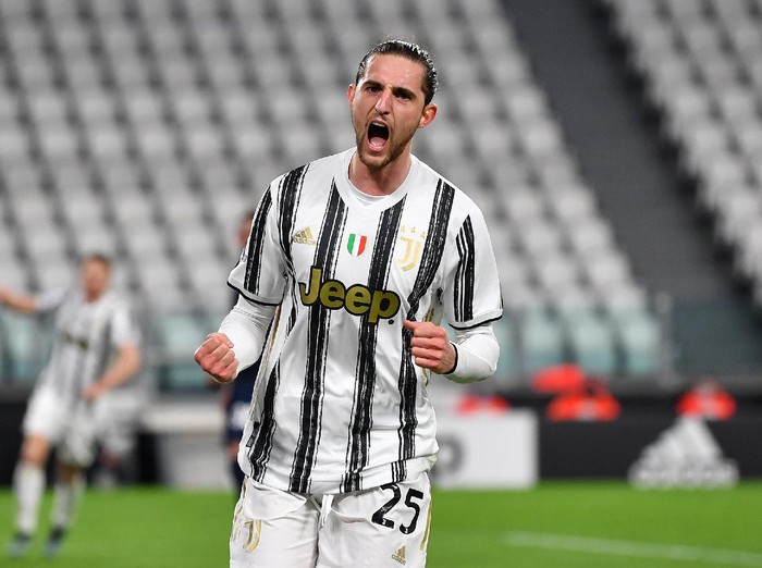 TURIN, ITALY - MARCH 06: Adrien Rabiot of Juventus celebrates after scoring their team's first goal  during the Serie A match between Juventus  and SS Lazio at Allianz Stadium on March 06, 2021 in Turin, Italy. Sporting stadiums around Italy remain under strict restrictions due to the Coronavirus Pandemic as Government social distancing laws prohibit fans inside venues resulting in games being played behind closed doors. (Photo by Valerio Pennicino/Getty Images)
