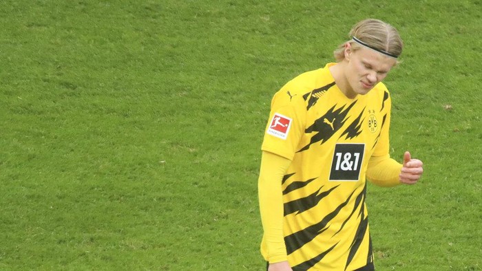 Dortmunds Erling Haaland reacts during the German Bundesliga soccer match between Cologne and Dortmund at the RheinEnergieStadion stadium in Cologne, Germany, Saturday, March 20, 2021. (Thilo Schmuelgen/Pool via AP)
