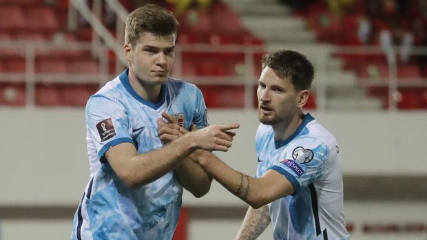 Soccer Football - World Cup Qualifiers Europe - Group G - Gibraltar v Norway - Victoria Stadium, Gibraltar - March 24, 2021 Norway's Alexander Sorloth celebrates scoring their first goal with Stefan Strandberg REUTERS/Jon Nazca