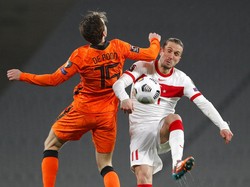 Turki tampil agresif dalam pertandingan pembukaan Kualifikasi Piala Dunia 2022 zona Eropa tersebut. Murad Sezer/Pool Photo via AP.