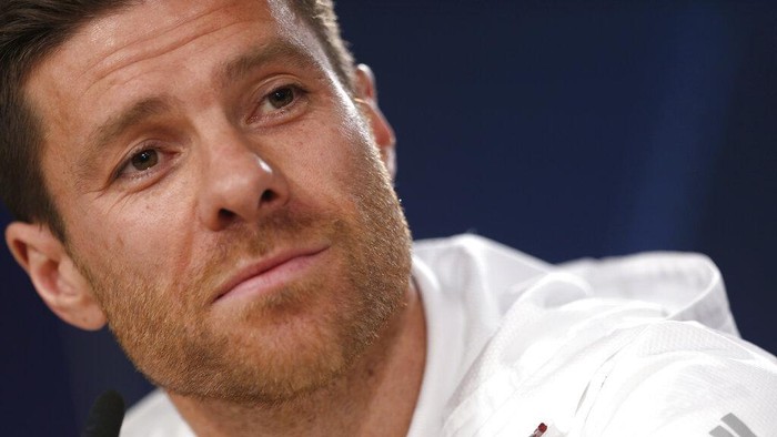 FILE - In this April 17, 2017 file photo, Bayern Munichs Xabi Alonso listens to a question during a news conference at the Santiago Bernabeu stadium in Madrid, Spain. German media reports say that former Spain midfielder Xabi Alonso is to take over at Borussia Moenchengladbach coach next season. The tabloid Bild and its sister magazine Sport Bild first reported that the 39-year-old Alonso has agreed to take over from current Gladbach coach Marco Rose, who is joining Borussia Dortmund next season. (AP Photo/Francisco Seco, File)