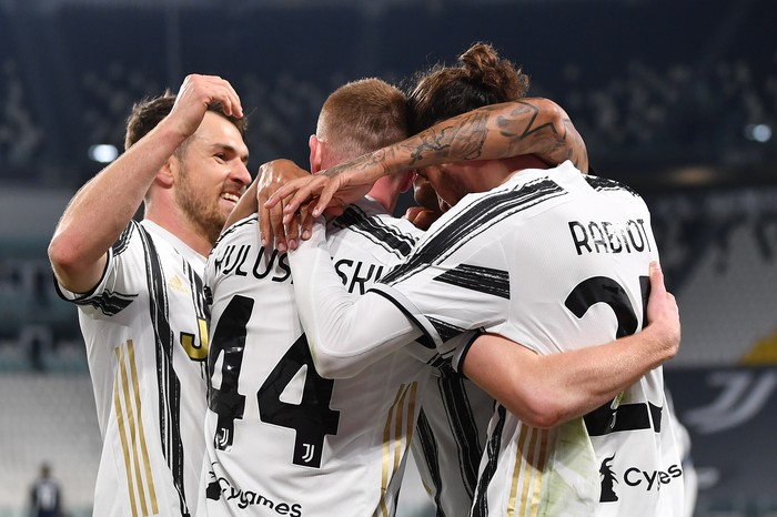 TURIN, ITALY - MARCH 06: Adrien Rabiot of Juventus celebrates with teammate Dejan Kulusevski and Aaron Ramsey  after scoring their team's first goal  during the Serie A match between Juventus  and SS Lazio at Allianz Stadium on March 06, 2021 in Turin, Italy. Sporting stadiums around Italy remain under strict restrictions due to the Coronavirus Pandemic as Government social distancing laws prohibit fans inside venues resulting in games being played behind closed doors. (Photo by Valerio Pennicino/Getty Images)