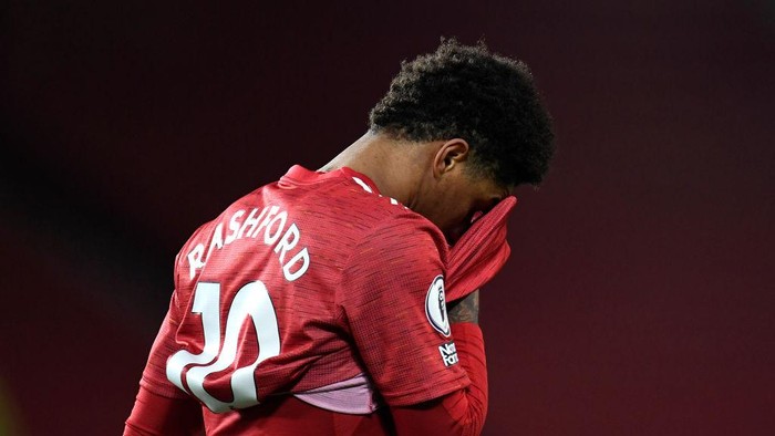 MANCHESTER, ENGLAND - MARCH 14: Marcus Rashford of Manchester United reacts during the Premier League match between Manchester United and West Ham United at Old Trafford on March 14, 2021 in Manchester, England. Sporting stadiums around the UK remain under strict restrictions due to the Coronavirus Pandemic as Government social distancing laws prohibit fans inside venues resulting in games being played behind closed doors. (Photo by Peter Powell - Pool/Getty Images)