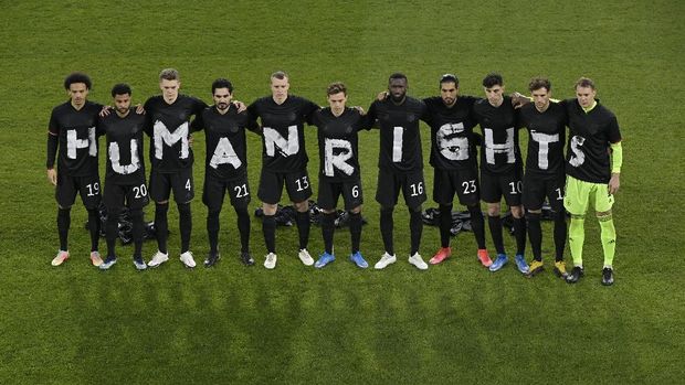 DUISBURG, GERMANY - MARCH 25: Players of Germany wear t-shirts which spell out 