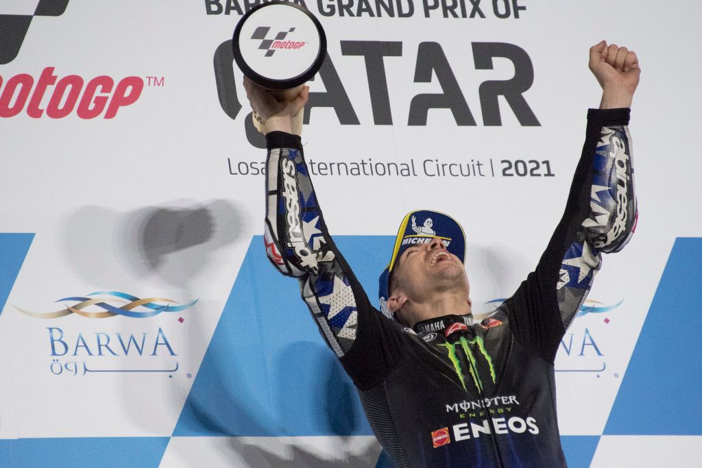 DOHA, QATAR - MARCH 28: Maverick Vinales of Spain and Monster Energy Yamaha MotoGP Team celebrates the victory on the podium at the end of the MotoGP race during the MotoGP of Qatar - Race at Losail Circuit on March 28, 2021 in Doha, Qatar. (Photo by Mirco Lazzari gp/Getty Images)