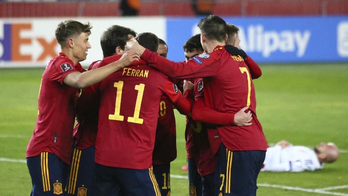 Spains players celebrates after scoring his sides second goal during the World Cup 2022 group B qualifying soccer match between Georgia and Spain at Boris Paichadze Dinamo Arena in Tbilisi, Georgia, Sunday, March 28, 2021. (AP Photo/Zurab Tsertsvadze)