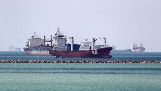 Ships are seen at the entrance of Suez Canal, where stranded container ship Ever Given run aground, Egypt March 28, 2021. REUTERS/Mohamed Abd El Ghany