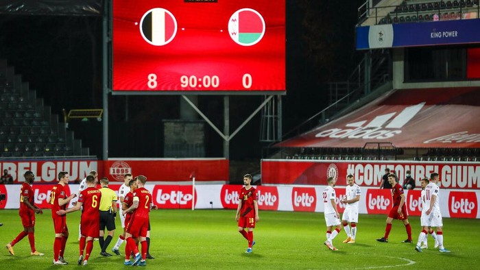 Belgium and Belarus players at the end of the World Cup 2022 group E qualifying soccer match between Belgium and Belarus at the King Power stadium in Leuven, Belgium, Tuesday, March 30, 2021. (AP Photo/Francisco Seco)