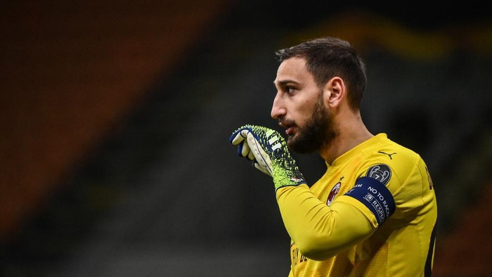AC Milans Italian goalkeeper Gianluigi Donnarumma reacts during the UEFA Europa League round of 16 second leg football match between AC Milan and Manchester United at San Siro stadium in Milan on March 18, 2021. (Photo by Marco BERTORELLO / AFP)