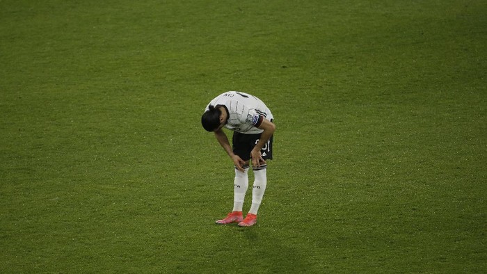DUISBURG, GERMANY - MARCH 31: Emre Can of Germany reacts after conceding their sides second goal during the FIFA World Cup 2022 Qatar qualifying match between Germany and North Macedonia at Schauinsland-Reisen-Arena on March 31, 2021 in Duisburg, Germany. Sporting stadiums around Germany remain under strict restrictions due to the Coronavirus Pandemic as Government social distancing laws prohibit fans inside venues resulting in games being played behind closed doors. (Photo by Thilo Schmuelgen - Pool/Getty Images)