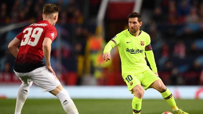 MANCHESTER, ENGLAND - APRIL 10: Barcelona player Lionel Messi in action during the UEFA Champions League Quarter Final first leg match between Manchester United and FC Barcelona at Old Trafford on April 10, 2019 in Manchester, England. (Photo by Stu Forster/Getty Images)