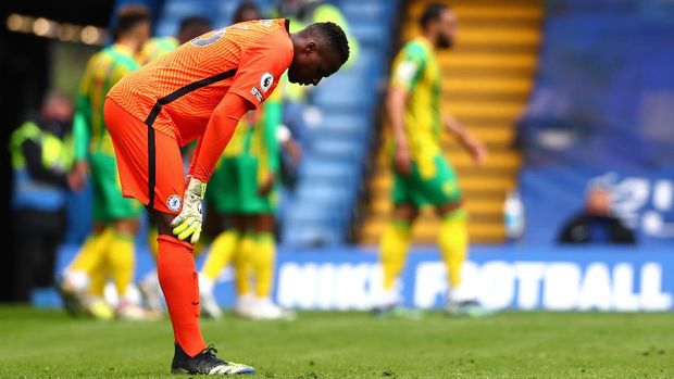 LONDON, ENGLAND - APRIL 03: Edouard Mendy of Chelsea looks dejected during the Premier League match between Chelsea and West Bromwich Albion at Stamford Bridge on April 03, 2021 in London, England. Sporting stadiums around the UK remain under strict restrictions due to the Coronavirus Pandemic as Government social distancing laws prohibit fans inside venues resulting in games being played behind closed doors. (Photo by Clive Rose/Getty Images)
