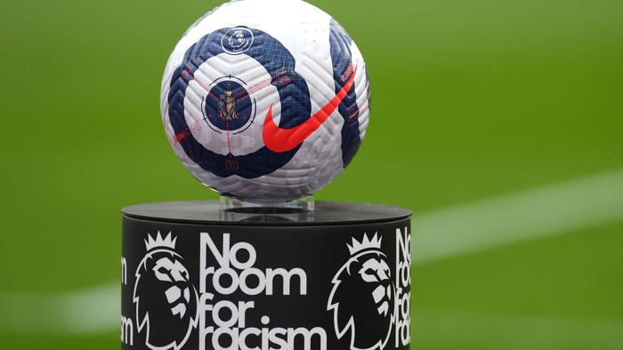 LONDON, ENGLAND - MARCH 21: Detailed view of the Nike match ball on a No room for racism plinth during the Premier League match between West Ham United and Arsenal at London Stadium on March 21, 2021 in London, England. Sporting stadiums around the UK remain under strict restrictions due to the Coronavirus Pandemic as Government social distancing laws prohibit fans inside venues resulting in games being played behind closed doors.  (Photo by Mike Hewitt/Getty Images)