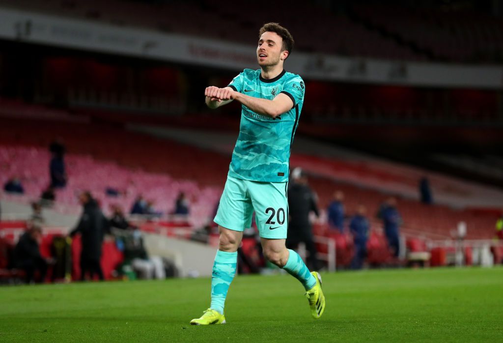 LONDON, ENGLAND - APRIL 03: Diogo Jota of Liverpool celebrates after scoring their team's first goal during the Premier League match between Arsenal and Liverpool at Emirates Stadium on April 03, 2021 in London, England. Sporting stadiums around the UK remain under strict restrictions due to the Coronavirus Pandemic as Government social distancing laws prohibit fans inside venues resulting in games being played behind closed doors. (Photo by Adam Davy - Pool/Getty Images)