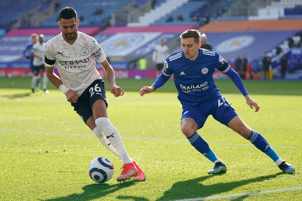 LEICESTER, ENGLAND - APRIL 03: Kevin De Bruyne of Manchester City  battles for possession with Wesley Fofana of Leicester City during the Premier League match between Leicester City and Manchester City at The King Power Stadium on April 03, 2021 in Leicester, England. Sporting stadiums around the UK remain under strict restrictions due to the Coronavirus Pandemic as Government social distancing laws prohibit fans inside venues resulting in games being played behind closed doors. (Photo by Rui Vieira - Pool/Getty Images)