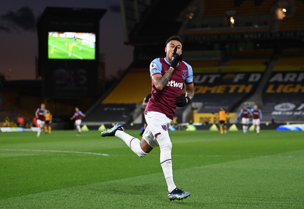 WOLVERHAMPTON, ENGLAND - APRIL 05: Jesse Lingard of West Ham United celebrates after scoring their team's first goal during the Premier League match between Wolverhampton Wanderers and West Ham United at Molineux on April 05, 2021 in Wolverhampton, England. Sporting stadiums around the UK remain under strict restrictions due to the Coronavirus Pandemic as Government social distancing laws prohibit fans inside venues resulting in games being played behind closed doors. (Photo by Laurence Griffiths/Getty Images)