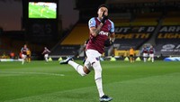 Lingard pamer aksi lagi di West Ham, kali ini dengan mencetak gol pertama timnya di markas Wolves. (Foto: Getty Images/Laurence Griffiths)