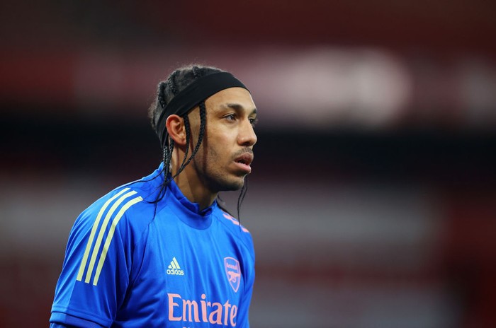 LONDON, ENGLAND - APRIL 03: Pierre-Emerick Aubameyang of Arsenal looks on as he warms up prior to the Premier League match between Arsenal and Liverpool at Emirates Stadium on April 03, 2021 in London, England. Sporting stadiums around the UK remain under strict restrictions due to the Coronavirus Pandemic as Government social distancing laws prohibit fans inside venues resulting in games being played behind closed doors. (Photo by Julian Finney/Getty Images)