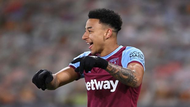 WOLVERHAMPTON, ENGLAND - APRIL 05: Jesse Lingard of West Ham United celebrates after scoring their team's first goal during the Premier League match between Wolverhampton Wanderers and West Ham United at Molineux on April 05, 2021 in Wolverhampton, England. Sporting stadiums around the UK remain under strict restrictions due to the Coronavirus Pandemic as Government social distancing laws prohibit fans inside venues resulting in games being played behind closed doors. (Photo by Laurence Griffiths/Getty Images)