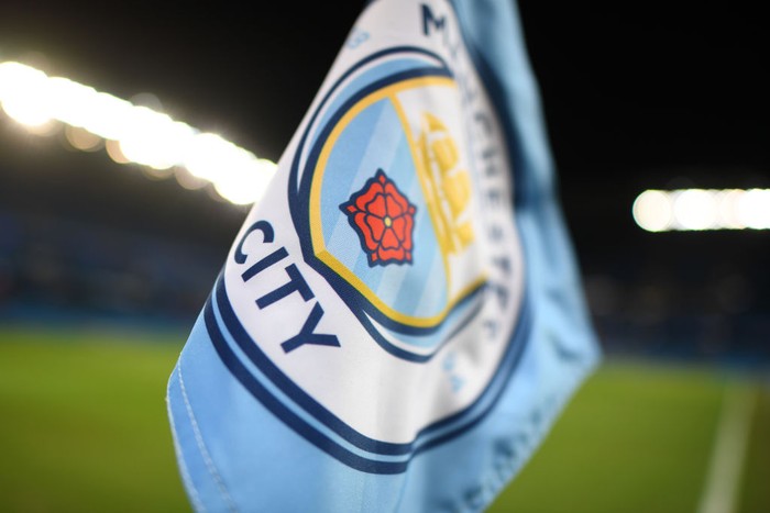 Manchester City MANCHESTER, ENGLAND - JANUARY 14: A corner flag with the Manchester City logo is seen inside the stadium prior to the Premier League match between Manchester City and Wolverhampton Wanderers at Etihad Stadium on January 14, 2019 in Manchester, United Kingdom. (Photo by Michael Regan/Getty Images)